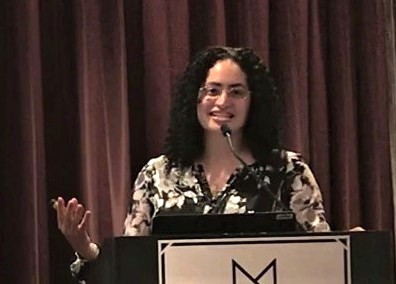 Yasmine S. Ali, MD giving a workplace well-being presentation at MCG Health All-Staff Meeting, 2018