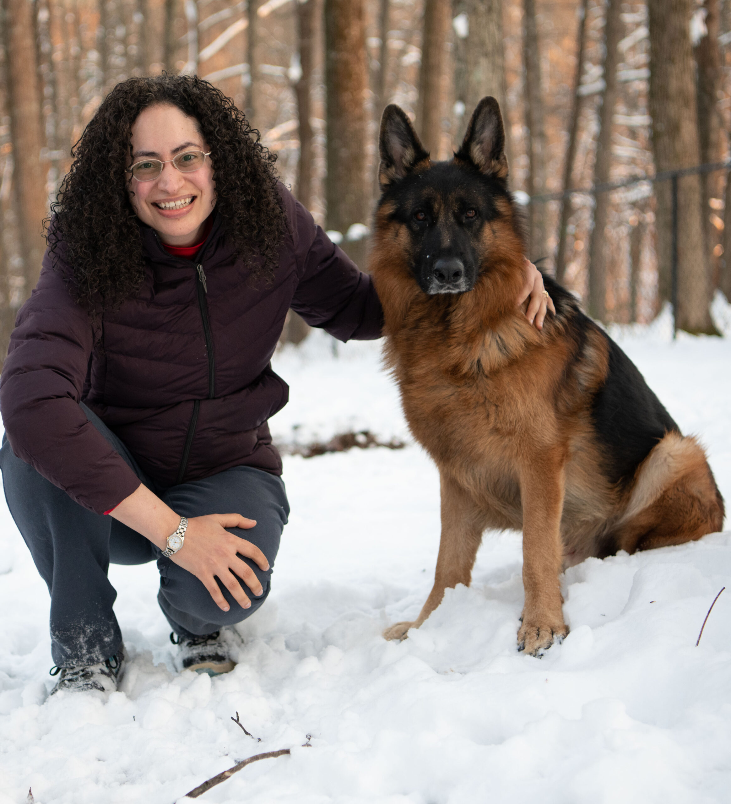 Yasmine S. Ali, MD with her German Shepherd Dog, Wyatt, in the snow